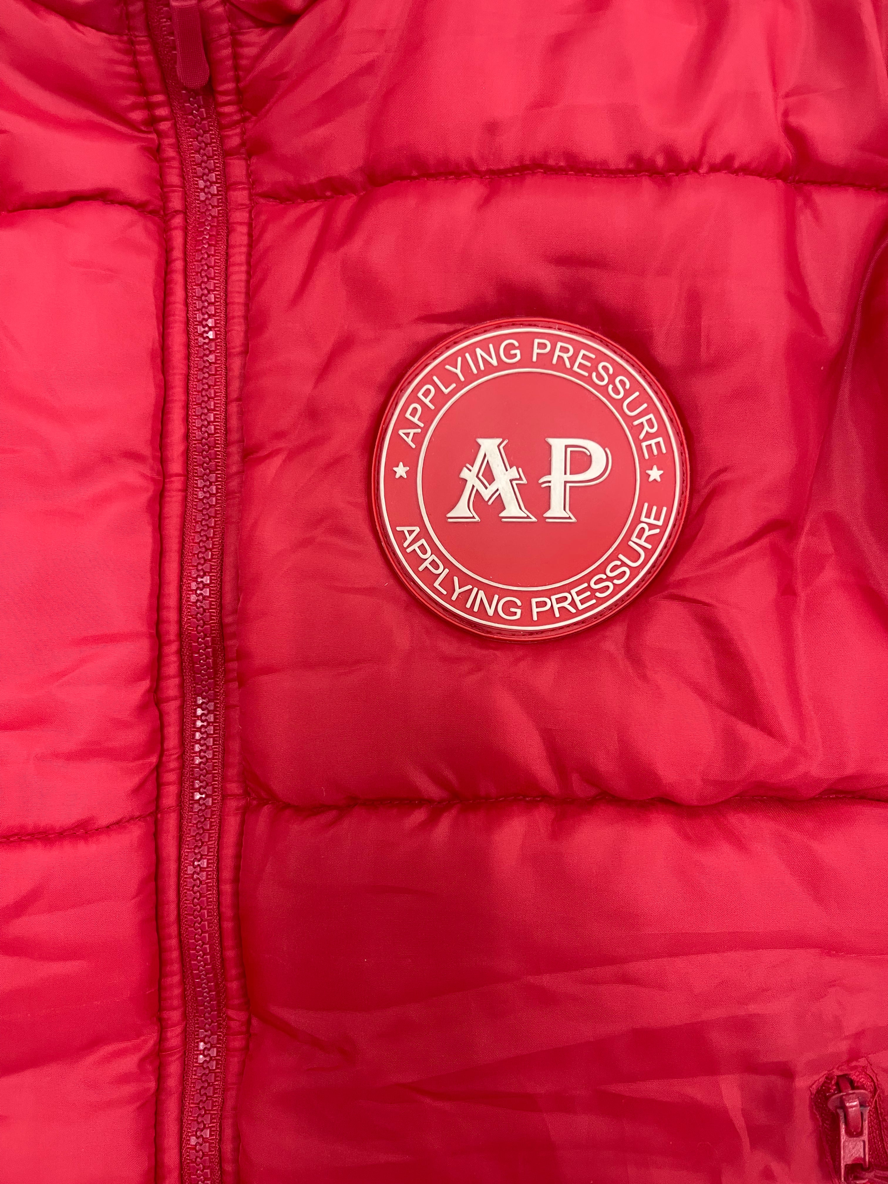 APPLYING PRESSURE COAT | RED